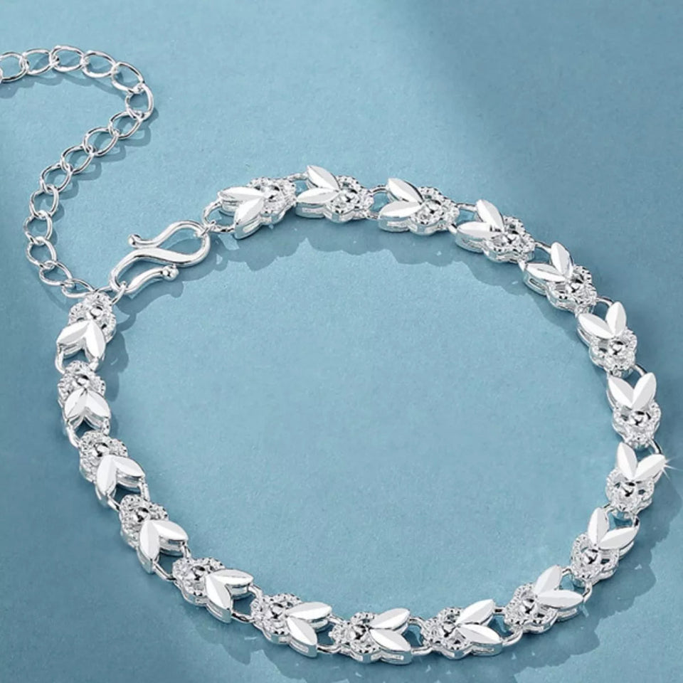 Luxury 925 sterling silver chain bracelet with a classic elegant link design.