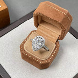 4 carat teardrop moissanite ring crafted in 925 sterling silver with a brilliant sparkling gemstone.