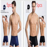 Four-pack men's boxer briefs in assorted colors.