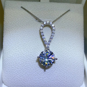 5 carat teardrop moissanite necklace crafted in 925 sterling silver with a brilliant sparkling gemstone.