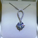 5 carat teardrop moissanite necklace crafted in 925 sterling silver with a brilliant sparkling gemstone.