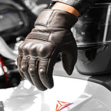 Men's winter motorcycle leather gloves with insulated lining for cold-weather riding.