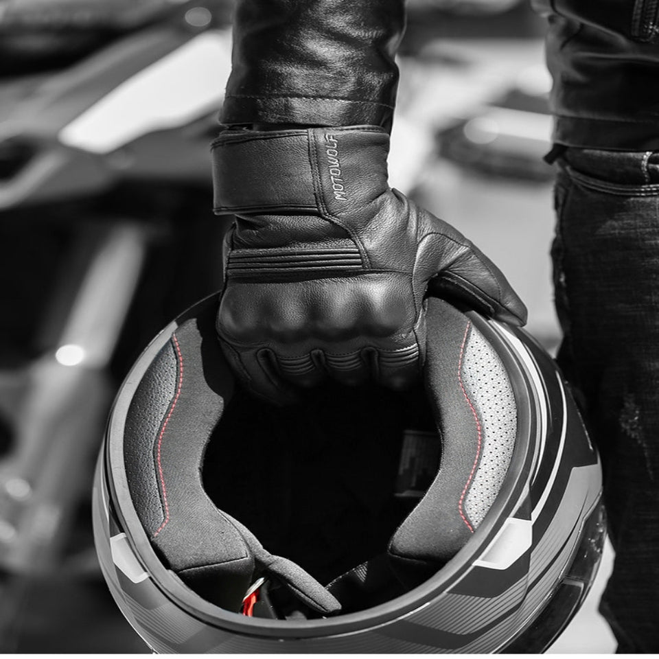 Men's winter motorcycle leather gloves with insulated lining for cold-weather riding.