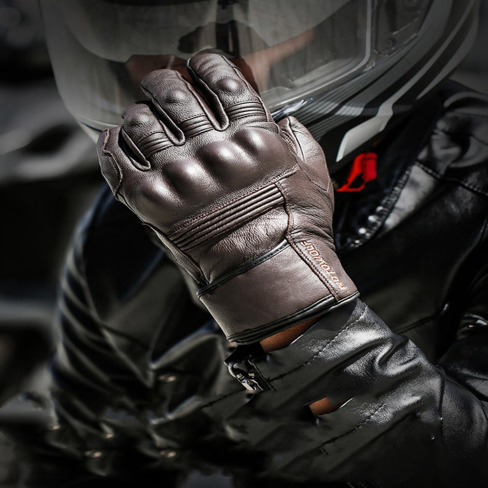 Men's winter motorcycle leather gloves with insulated lining for cold-weather riding.