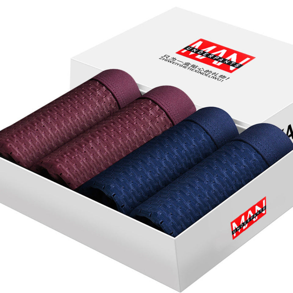 Four-pack men's boxer briefs in assorted colors.