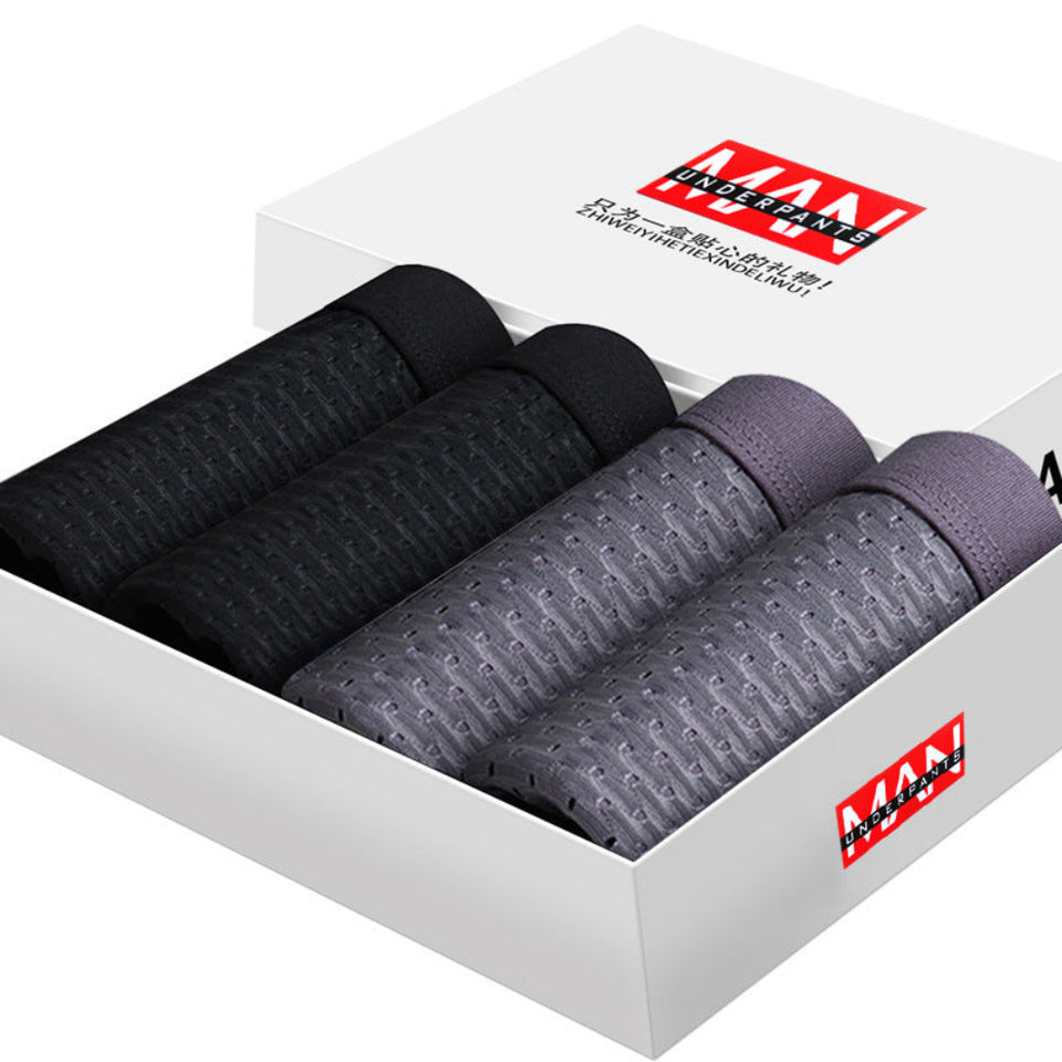 Four-pack men's boxer briefs in assorted colors.