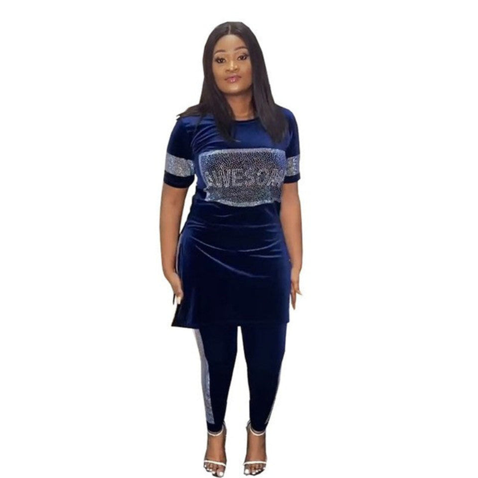 Woman wearing an elegant African print two-piece skirt set in a stylish traditional-inspired design.