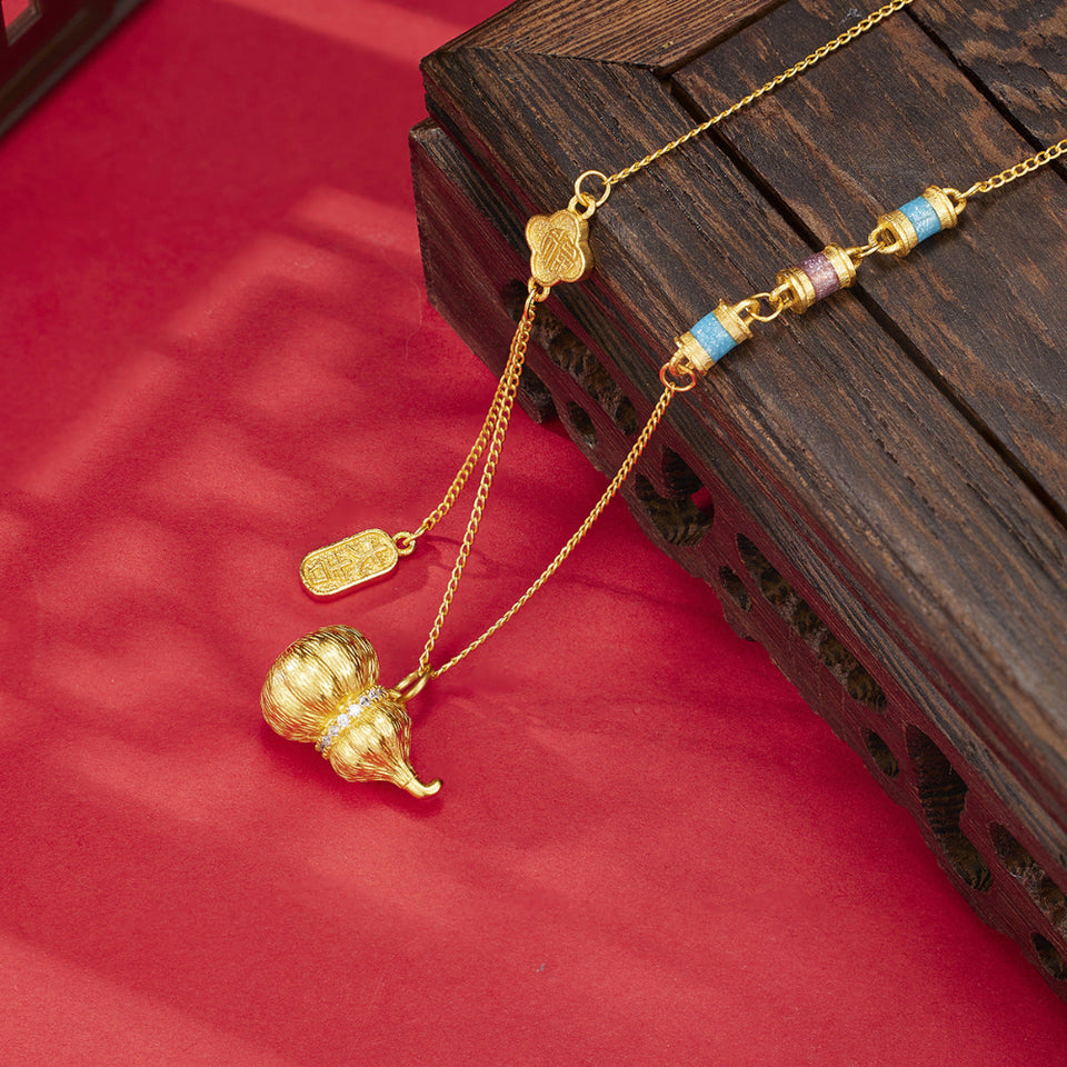 18K gold-plated gourd pendant necklace with an elegant polished finish.