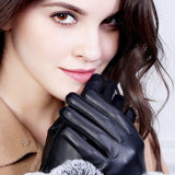 Women's touchscreen leather winter gloves with soft faux fur cuffs for stylish cold-weather protection.