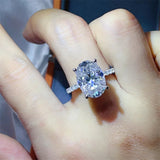 8 carat moissanite ring crafted in platinum-plated 925 sterling silver with a brilliant sparkling gemstone.
