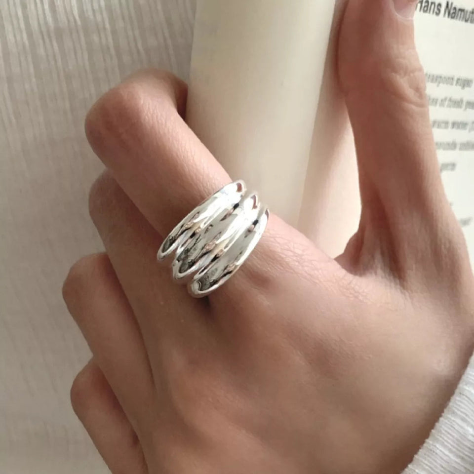 925 sterling silver open ring with a modern adjustable band design.