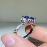 2 carat cobalt blue moissanite ring crafted in 925 sterling silver with a brilliant blue gemstone.