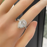 4 carat teardrop moissanite ring crafted in 925 sterling silver with a brilliant sparkling gemstone.