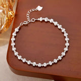 925 sterling silver beaded bracelet with a classic polished bead design.