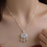 925 sterling silver lock pendant necklace with an elegant polished design.