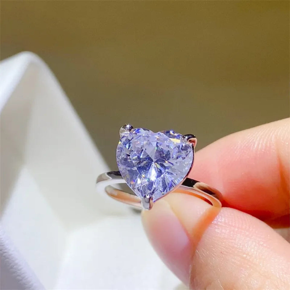 Luxury 5 carat heart-shaped moissanite ring in 925 sterling silver.