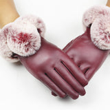 Women's touchscreen leather winter gloves with soft faux fur cuffs for stylish cold-weather protection.