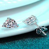 2 carat heart-shaped moissanite stud earrings with brilliant sparkling gemstones.