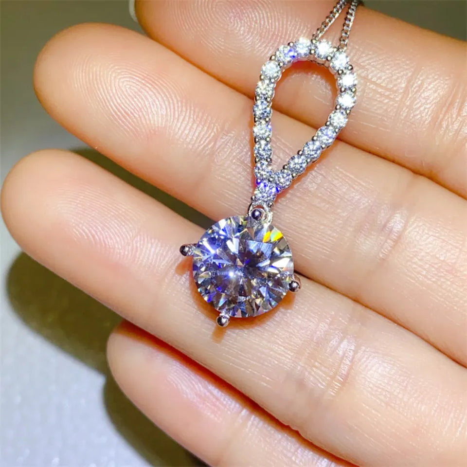 5 carat teardrop moissanite necklace crafted in 925 sterling silver with a brilliant sparkling gemstone.