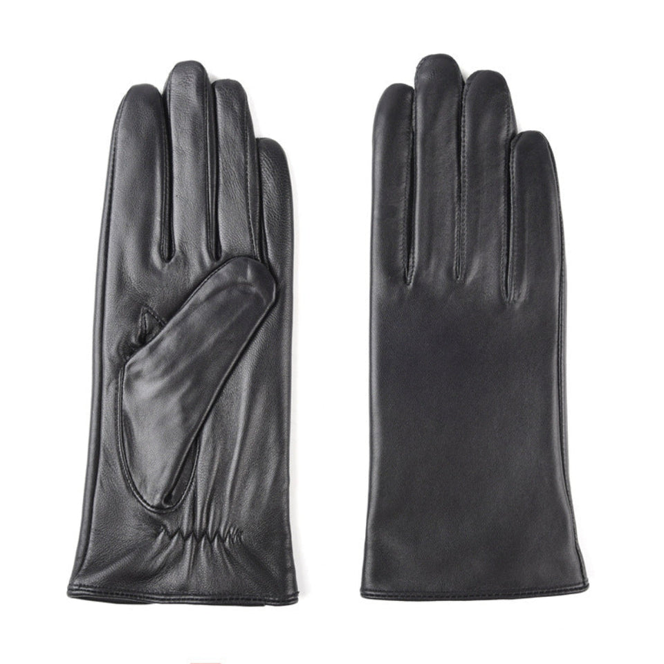 Women's warm leather winter gloves with soft insulated lining.