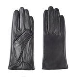 Women's warm leather winter gloves with soft insulated lining.