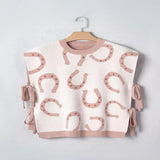 Women's horse shoe western print tied side cap sleeve knit top.