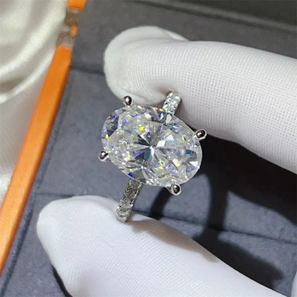 8 carat moissanite ring crafted in platinum-plated 925 sterling silver with a brilliant sparkling gemstone.
