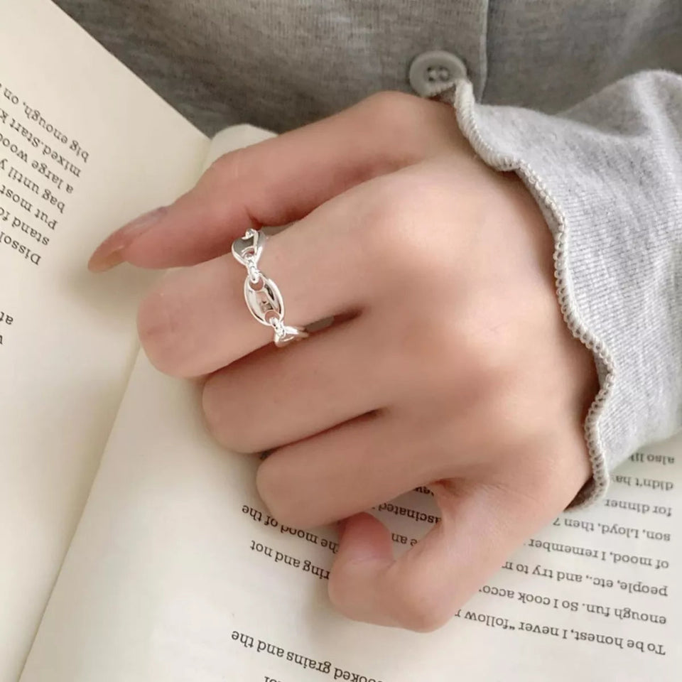 925 sterling silver pig's snout ring with a polished whimsical design.