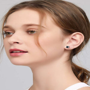 Square moissanite stud earrings crafted in 925 sterling silver with brilliant sparkling gemstones.