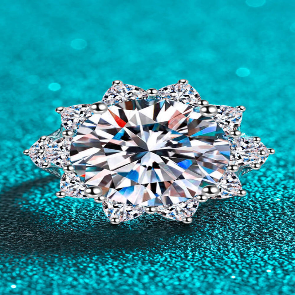 10 carat flower-shaped moissanite ring with brilliant sparkling gemstones.
