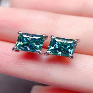 2 carat square moissanite four-prong earrings with brilliant sparkling gemstones.