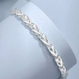 925 sterling silver heart link bracelet with elegant polished heart-shaped links.