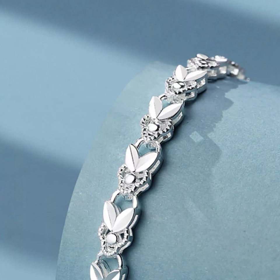Luxury 925 sterling silver chain bracelet with a classic elegant link design.