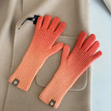 Fashion gradient winter gloves with a warm and stylish design.