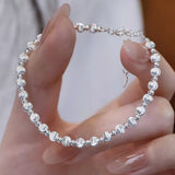 925 sterling silver beaded bracelet with a classic polished bead design.