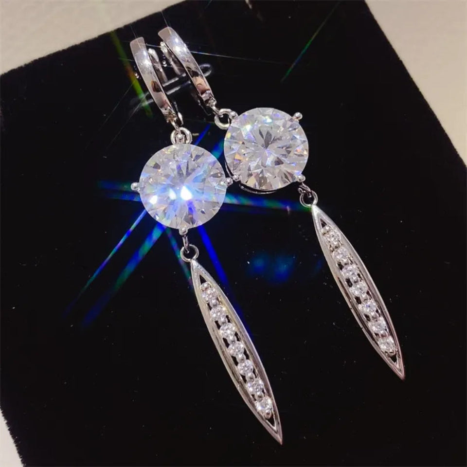 10 carat moissanite earrings crafted in 925 sterling silver with brilliant sparkling gemstones.