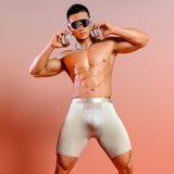 Male model wearing blue men's extended ice silk sports boxer briefs with breathable quick-dry compression fabric.