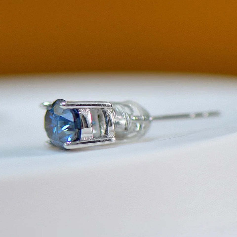 2 carat moissanite four-prong platinum-plated ring with a brilliant sparkling gemstone.
