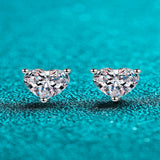 2 carat heart-shaped moissanite stud earrings with brilliant sparkling gemstones.