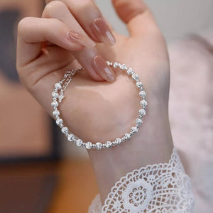 925 sterling silver beaded bracelet with a classic polished bead design.