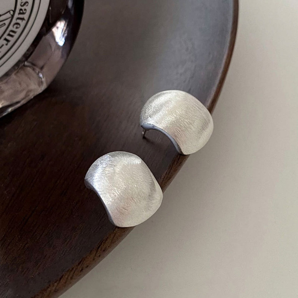 925 sterling silver stud earrings with a classic polished design.