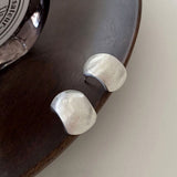 925 sterling silver stud earrings with a classic polished design.
