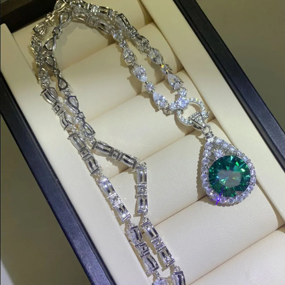 10 carat teardrop moissanite necklace crafted in 925 sterling silver with a brilliant sparkling gemstone.
