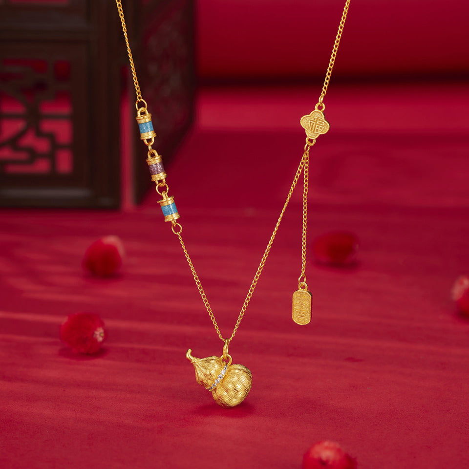 18K gold-plated gourd pendant necklace with an elegant polished finish.