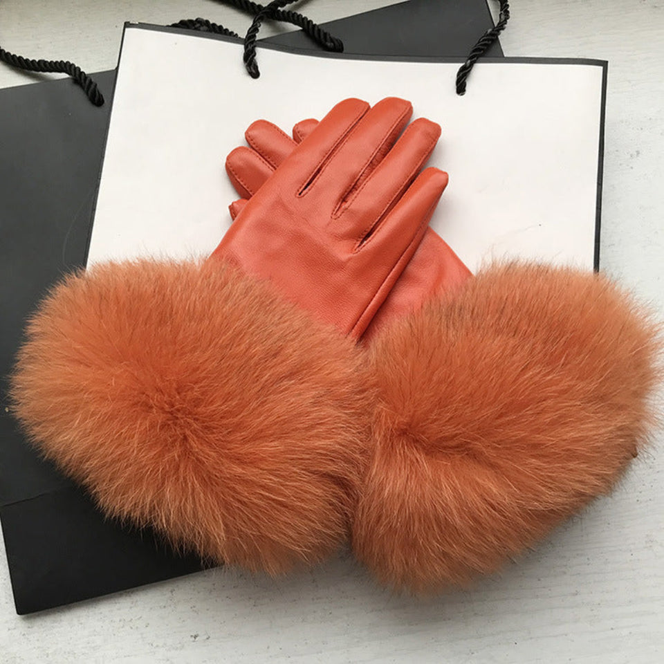 Women's genuine leather winter gloves with soft fox fur cuffs and warm wool lining for elegant cold-weather wear.