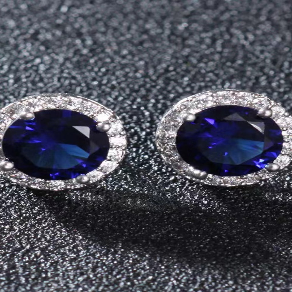 2 carat contrast moissanite platinum-plated stud earrings with brilliant sparkling gemstones.