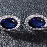 2 carat contrast moissanite platinum-plated stud earrings with brilliant sparkling gemstones.