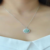 10 carat moissanite pendant necklace with a platinum-plated finish and brilliant sparkling gemstone.