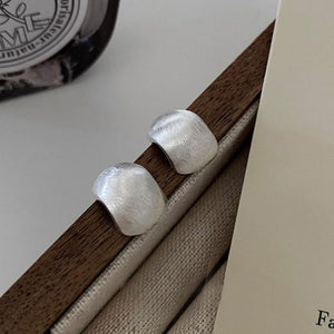 925 sterling silver stud earrings with a classic polished design.