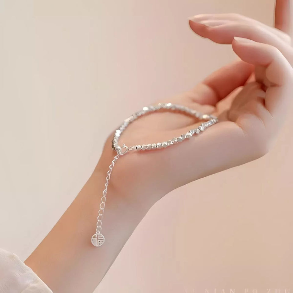 925 sterling silver geometric chain adjustable bracelet with a modern elegant design.